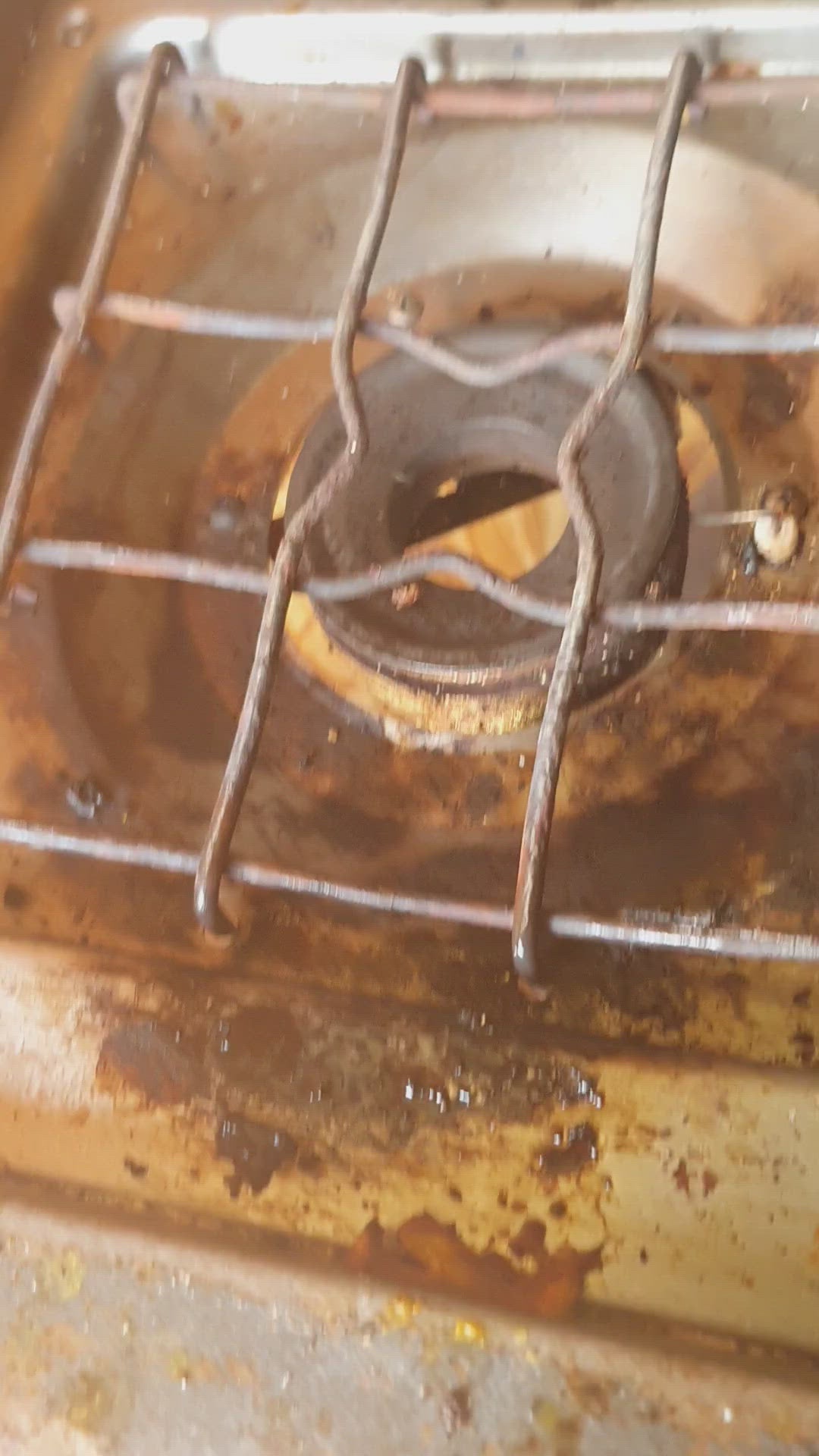 A revolting briaa burner before cleaning with Habitat oven cleaner