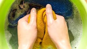 hand wash laundry with green bar soap